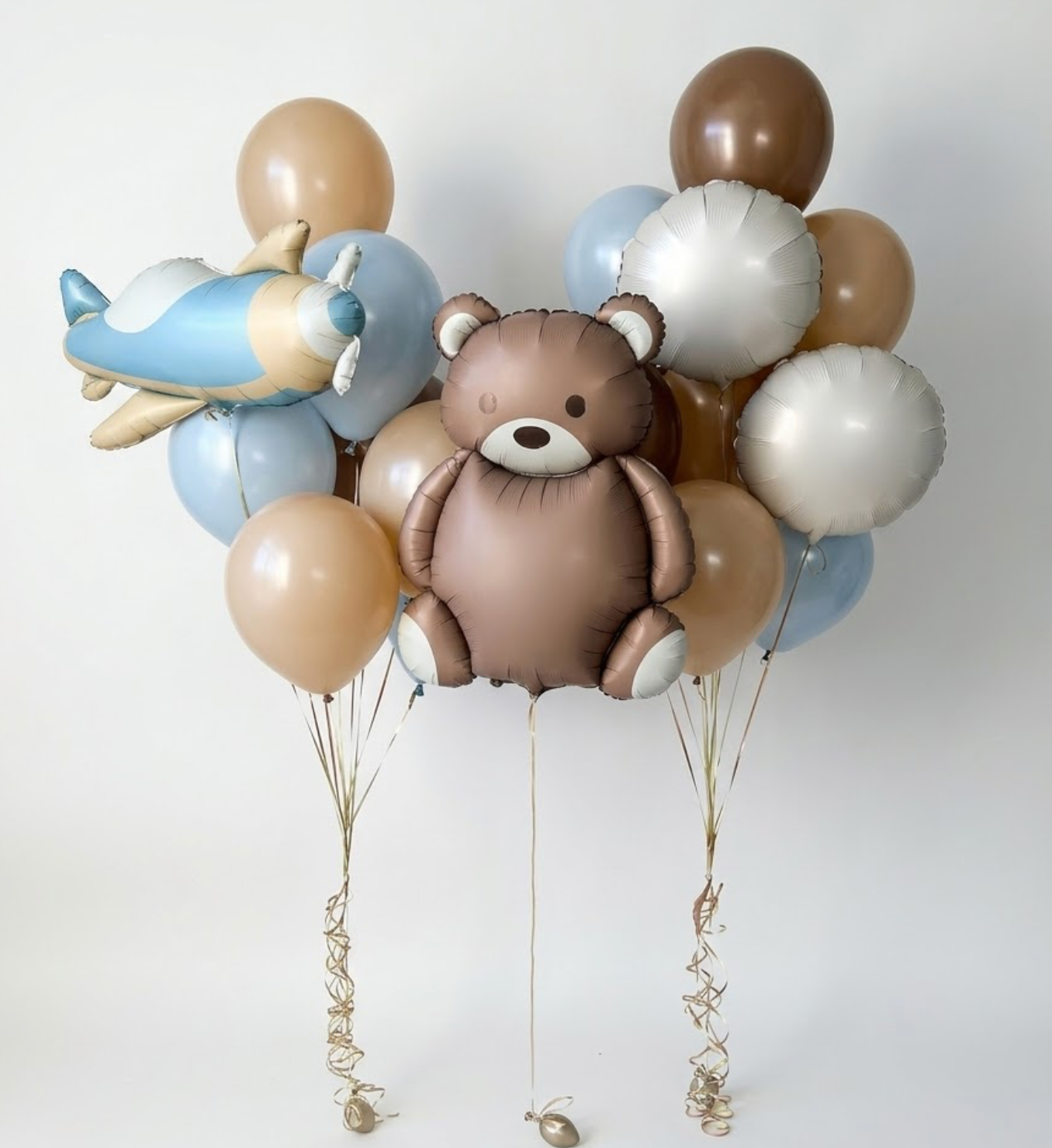 Little Bear balloon set with teddy bear balloon, airplane balloon, and soft blue neutral baby welcome balloon decor