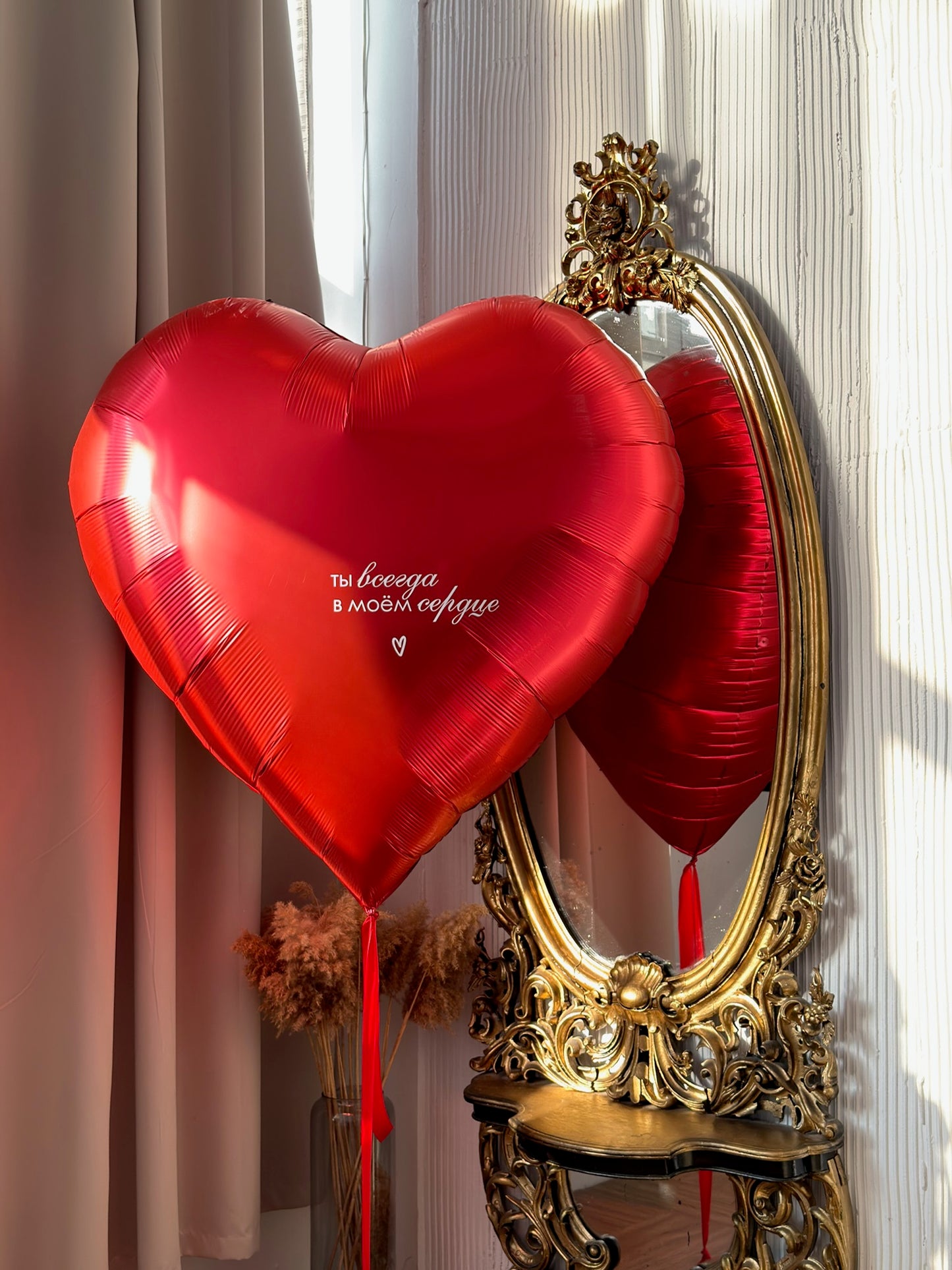 Large red heart balloon with custom message for romantic event decor in Manhattan