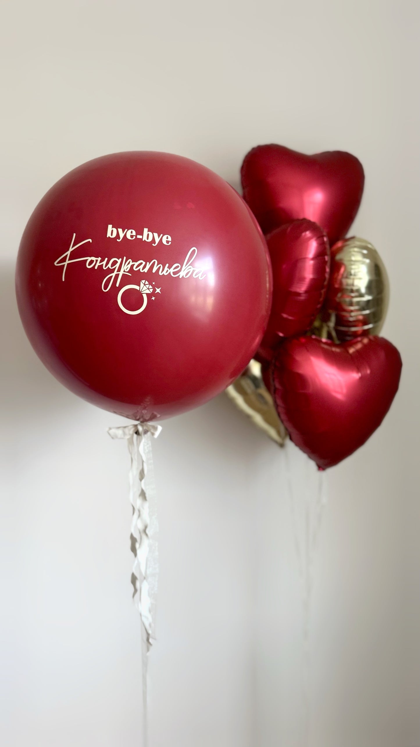 Red balloon set with custom sign latex balloon and heart balloons for party decor in NYC
