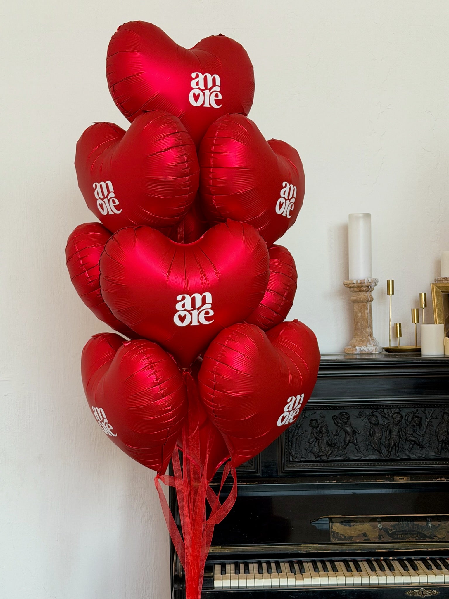 Red heart helium balloon arrangement for romantic room decor in Brooklyn