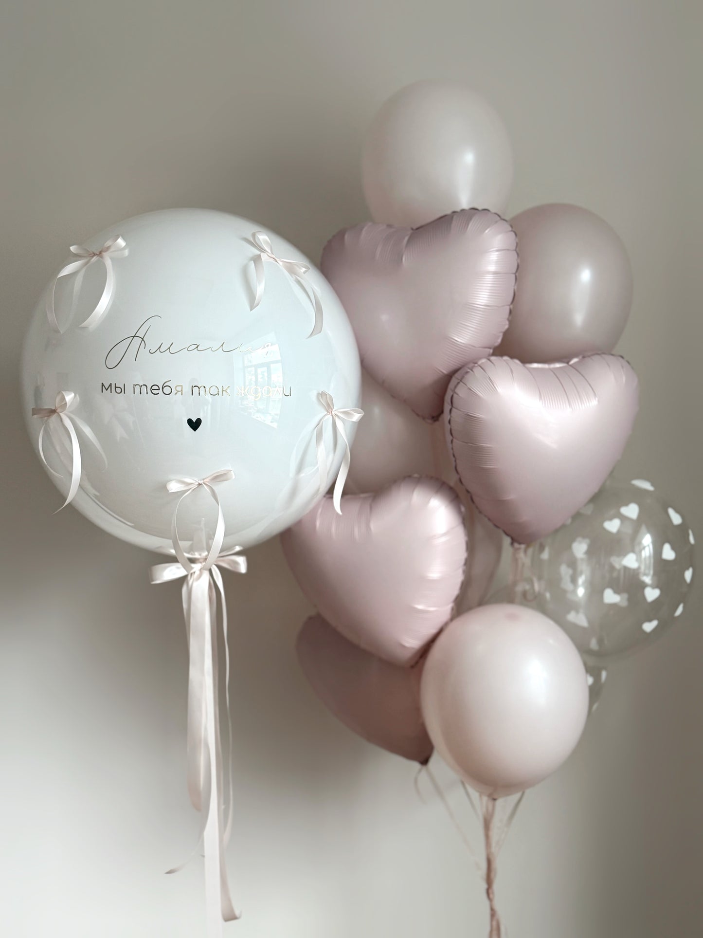Dusty rose bubble balloon set with custom sign, heart balloons, and matching latex balloons for event decor in NYC