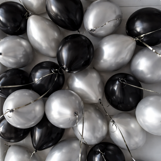 Black and silver helium ceiling balloons in New York City
