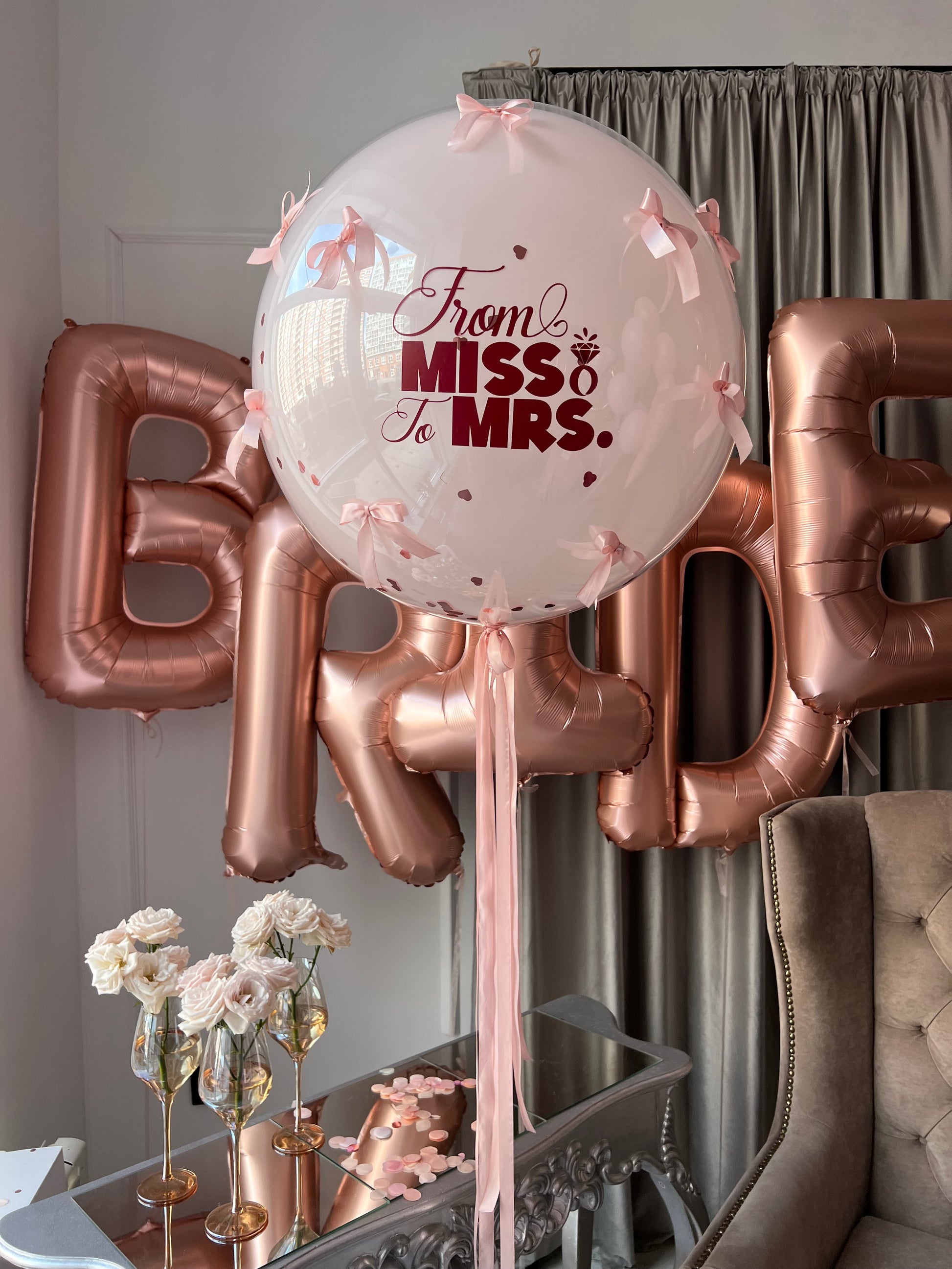 Almost Wife balloon set with custom double bubble balloon and BRIDE letter balloons for bridal party decor in New York