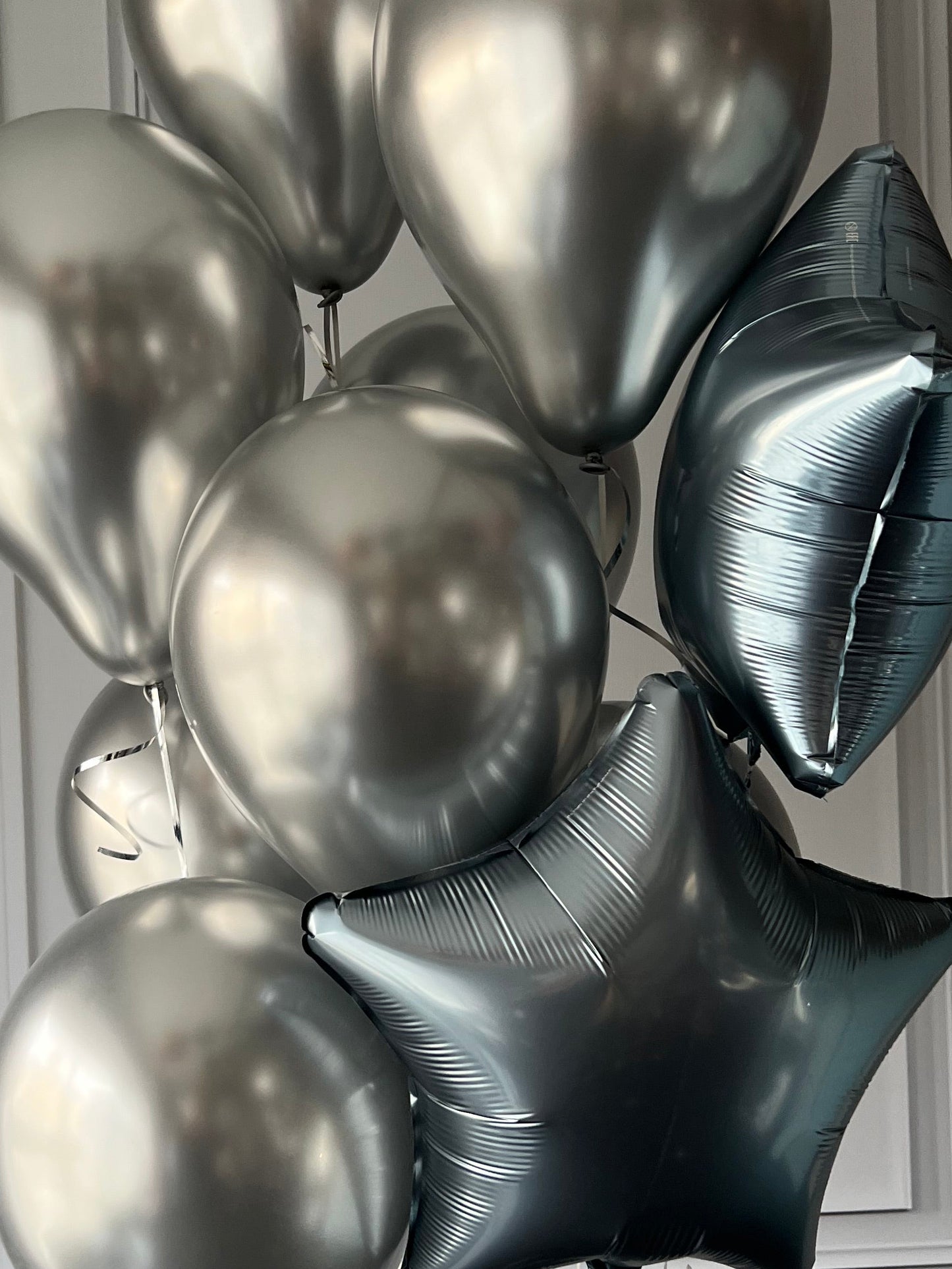 Arctic night balloon set with silver latex balloons and metallic star balloons for modern celebration decor in New York