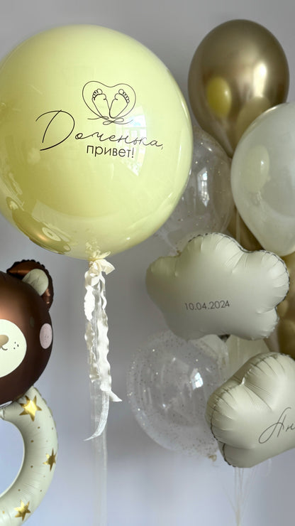 Close-up of baby bear balloon set with custom sign bubble balloon and neutral baby balloons in Brooklyn