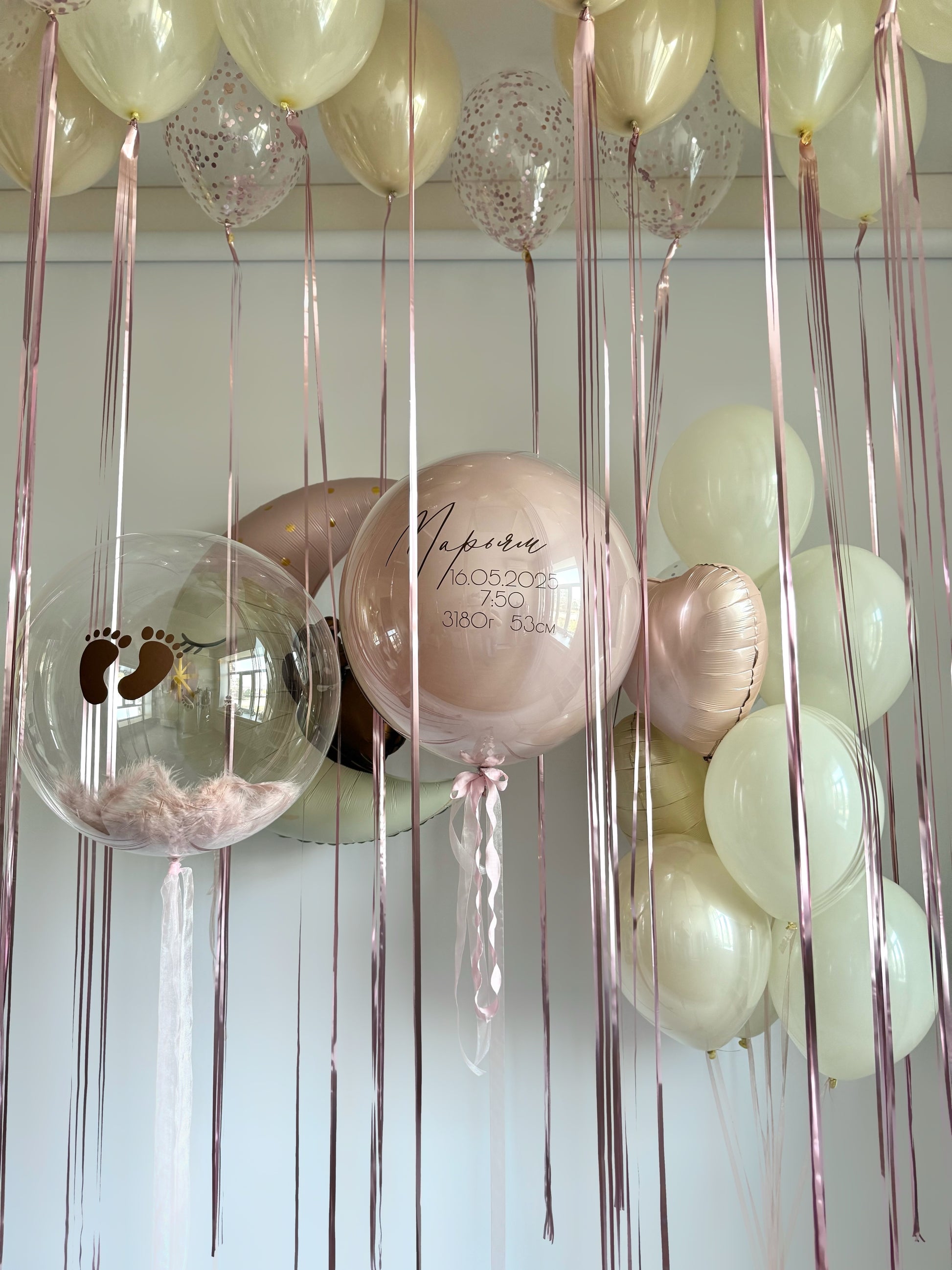 Baby blossom balloon set with custom bubble balloon, moon bear balloon, and pastel baby welcome decor in New York