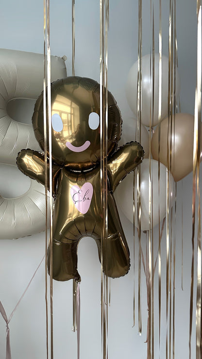 Gingerbread birthday balloon decor with neutral latex balloons for celebration styling in Manhattan