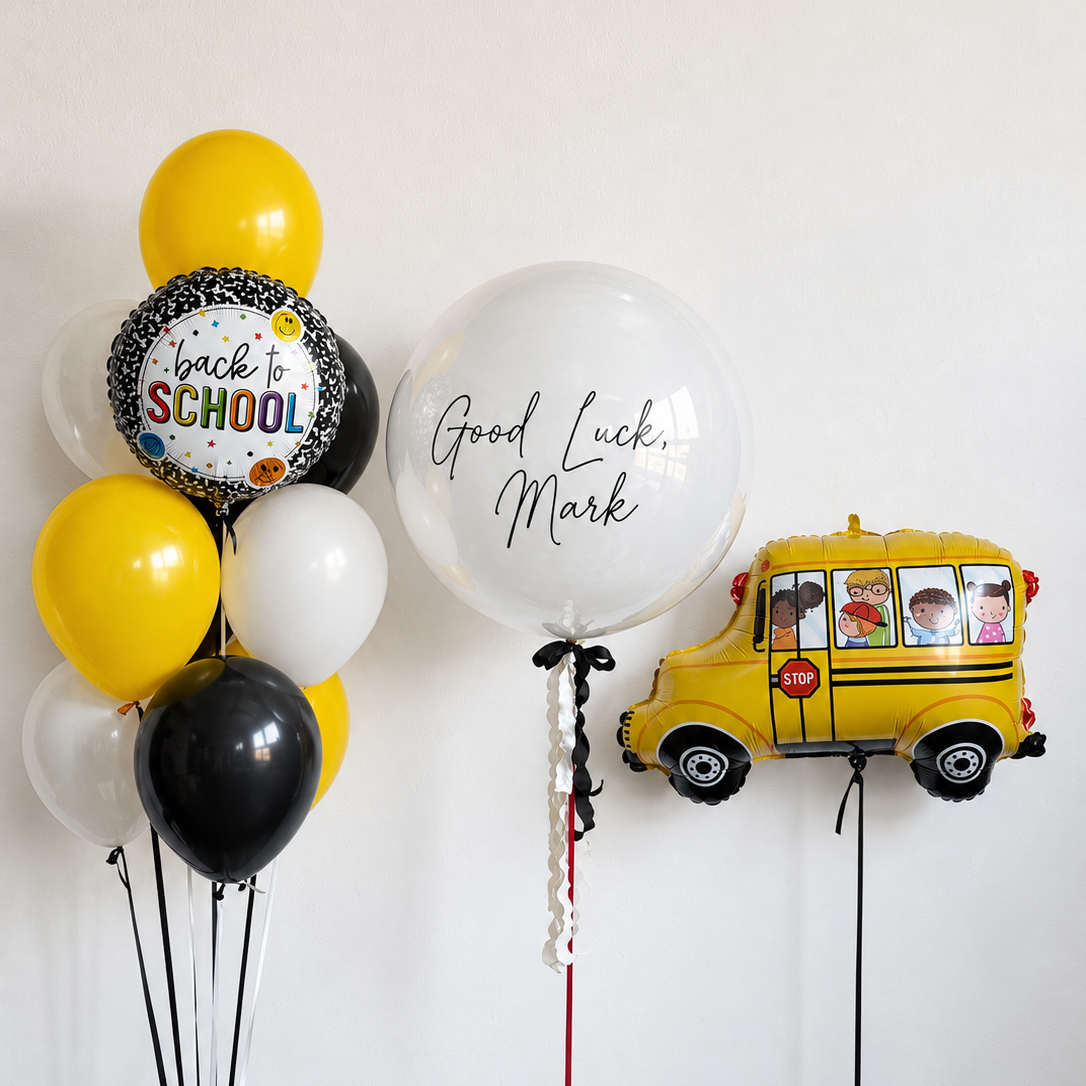 Back to School bubble balloon set with custom bubble balloon, school bus foil balloon, and latex balloons in Manhattan