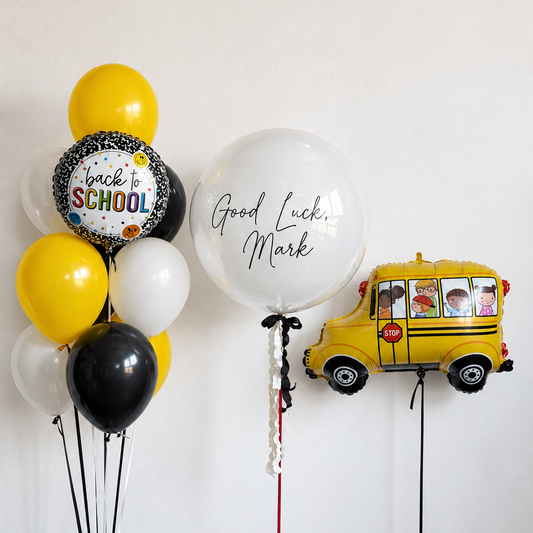 Back to School bubble balloon set with custom bubble balloon, school bus foil balloon, and latex balloons in Manhattan