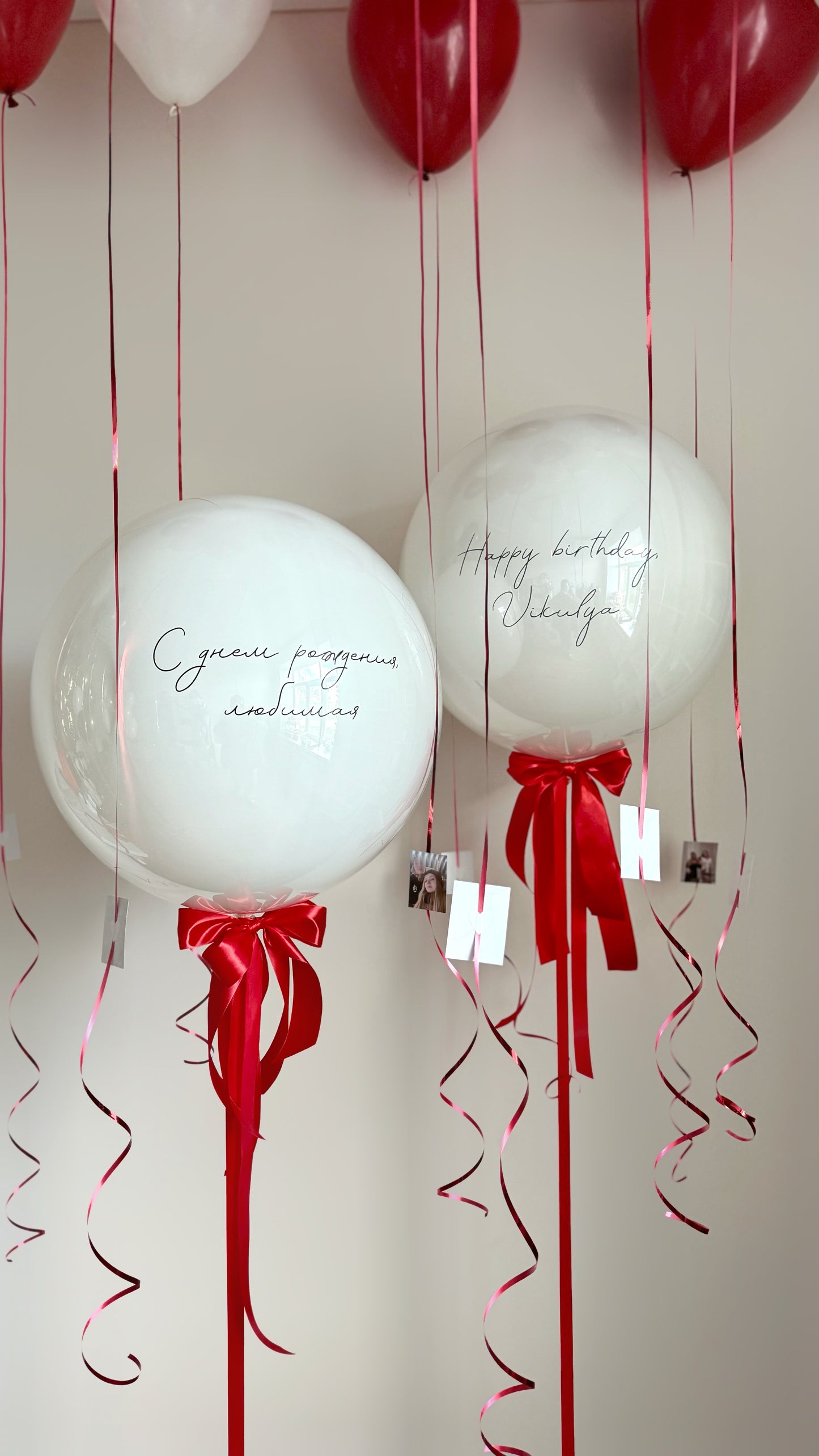 Personalized balloon setup with ceiling balloons and photo details for romantic room decor in Manhattan