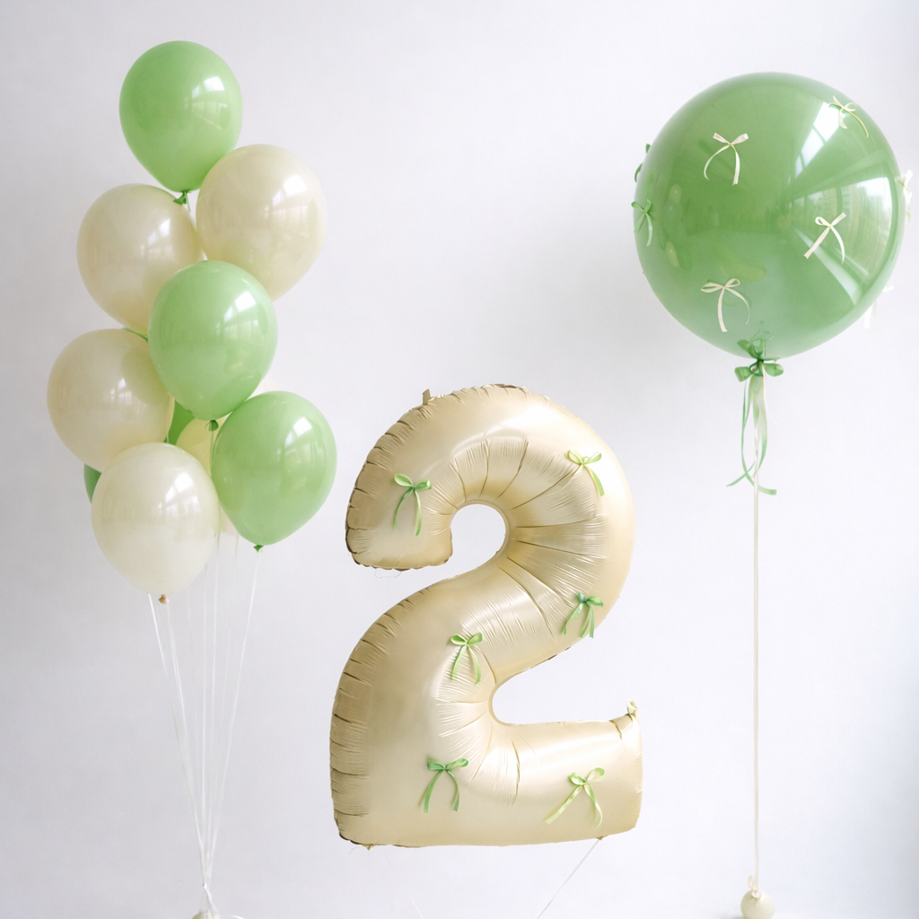 Bow Number Balloon Set with number balloon, bow bubble balloon, and glass balloon bunch in green tones for birthday decor in Brooklyn