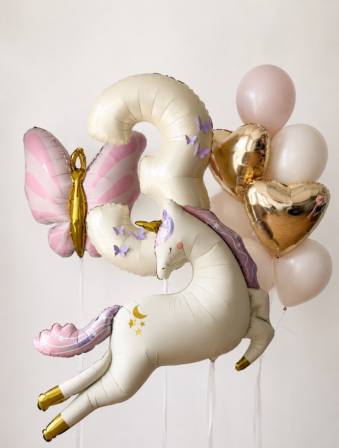 Butterfly Unicorn Number Balloon Set with number balloon, unicorn foil, butterfly foil, heart balloons, and pastel latex balloons in Queens