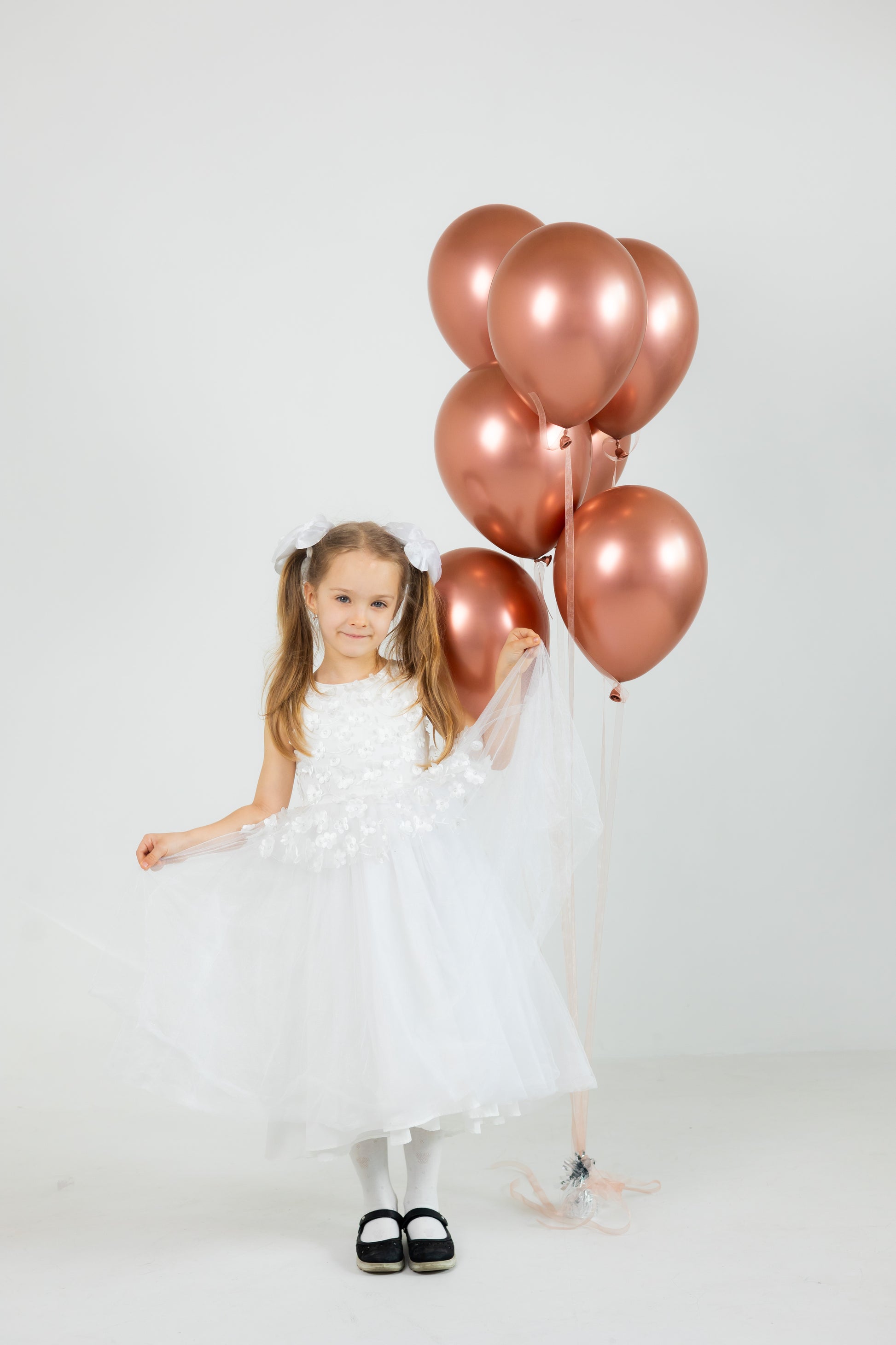 Champagne balloon bouquet with 7 latex balloons for elegant celebration decor in New York