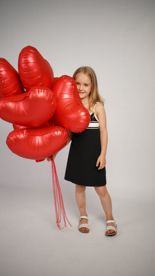 Cherry Kiss balloon set with red heart foil balloons for romantic celebration decor in New York