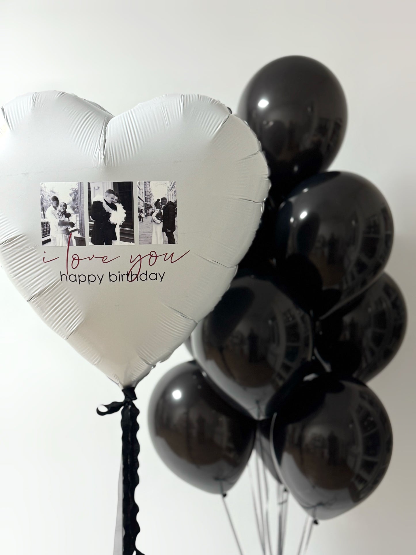 Classy surprise photo heart balloon set with black and white balloon decor for celebration styling in New York