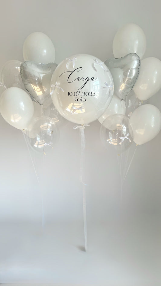 Clear welcome balloon set with custom double bubble balloon, white heart balloons, and elegant welcome decor in New York