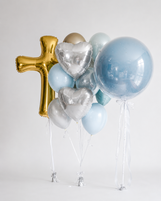 Cross Balloon Set with Bubble Balloon featuring a gold cross balloon, a bunch of blue, white, and silver balloons with silver hearts, and a custom bubble balloon for elegant celebration decor in Brooklyn