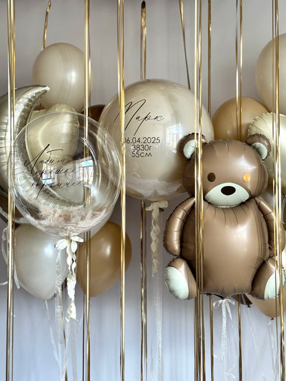 Cuddles balloon set with custom bubble balloons, moon balloon, teddy bear balloon, and baby welcome decor in New York