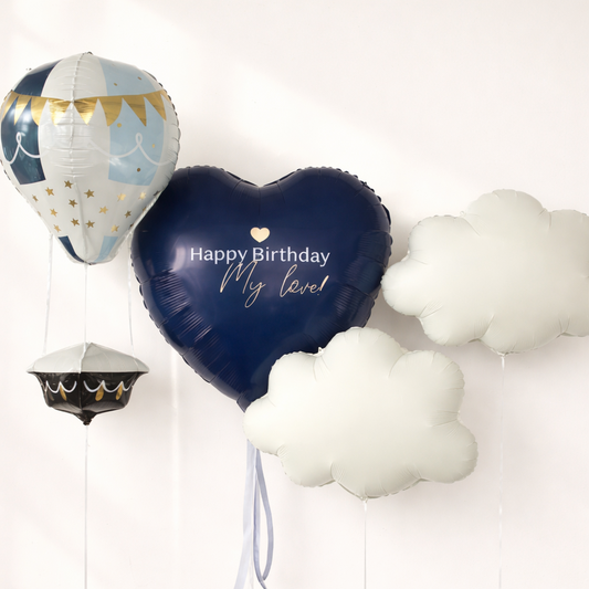Dream Flight Balloon Set with custom navy heart balloon, hot air balloon, and white cloud balloons for celebration decor in Brooklyn