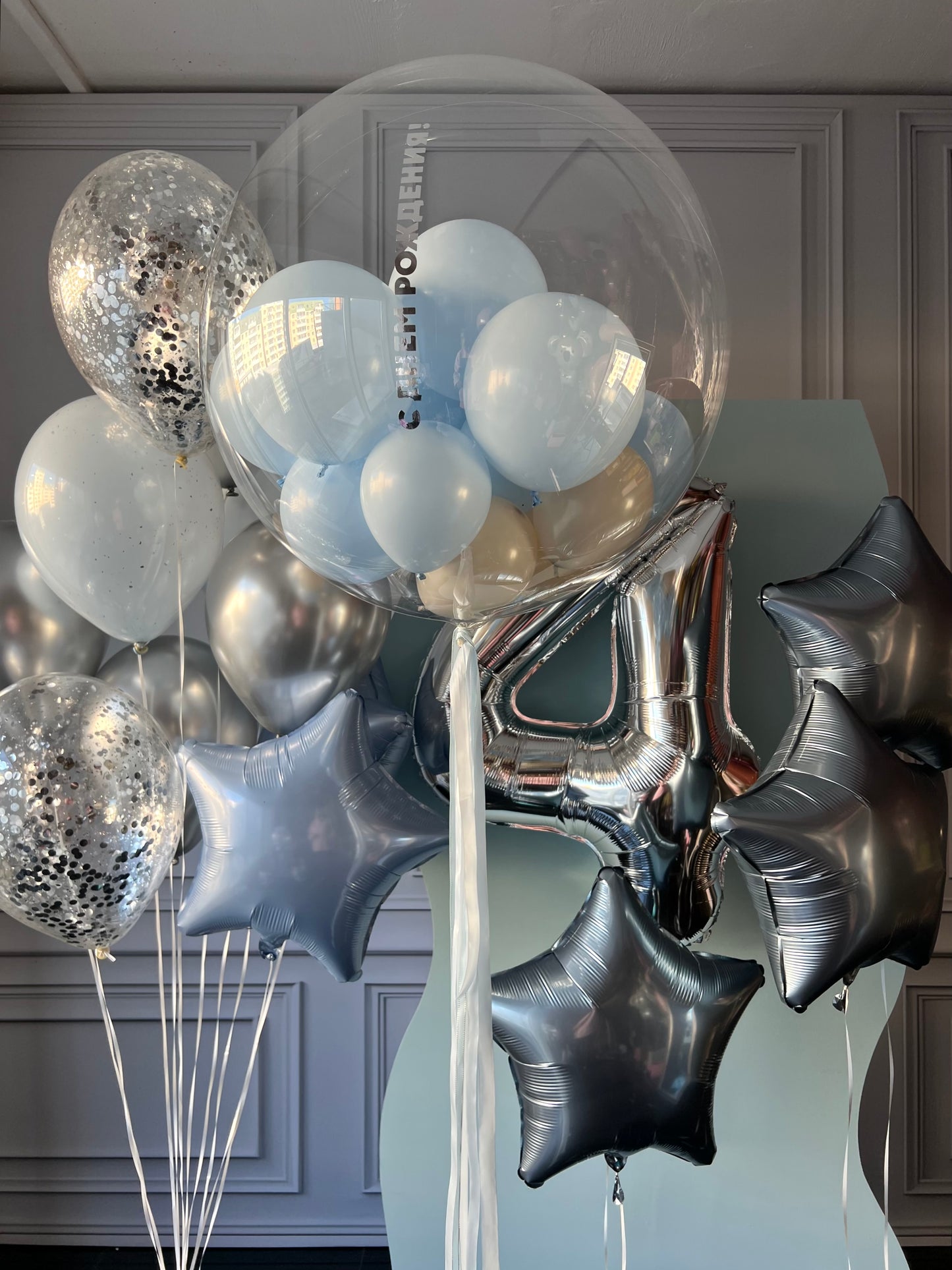 Feliz balloon set with custom bubble balloon, silver number balloon, and star balloons for birthday decor in New York