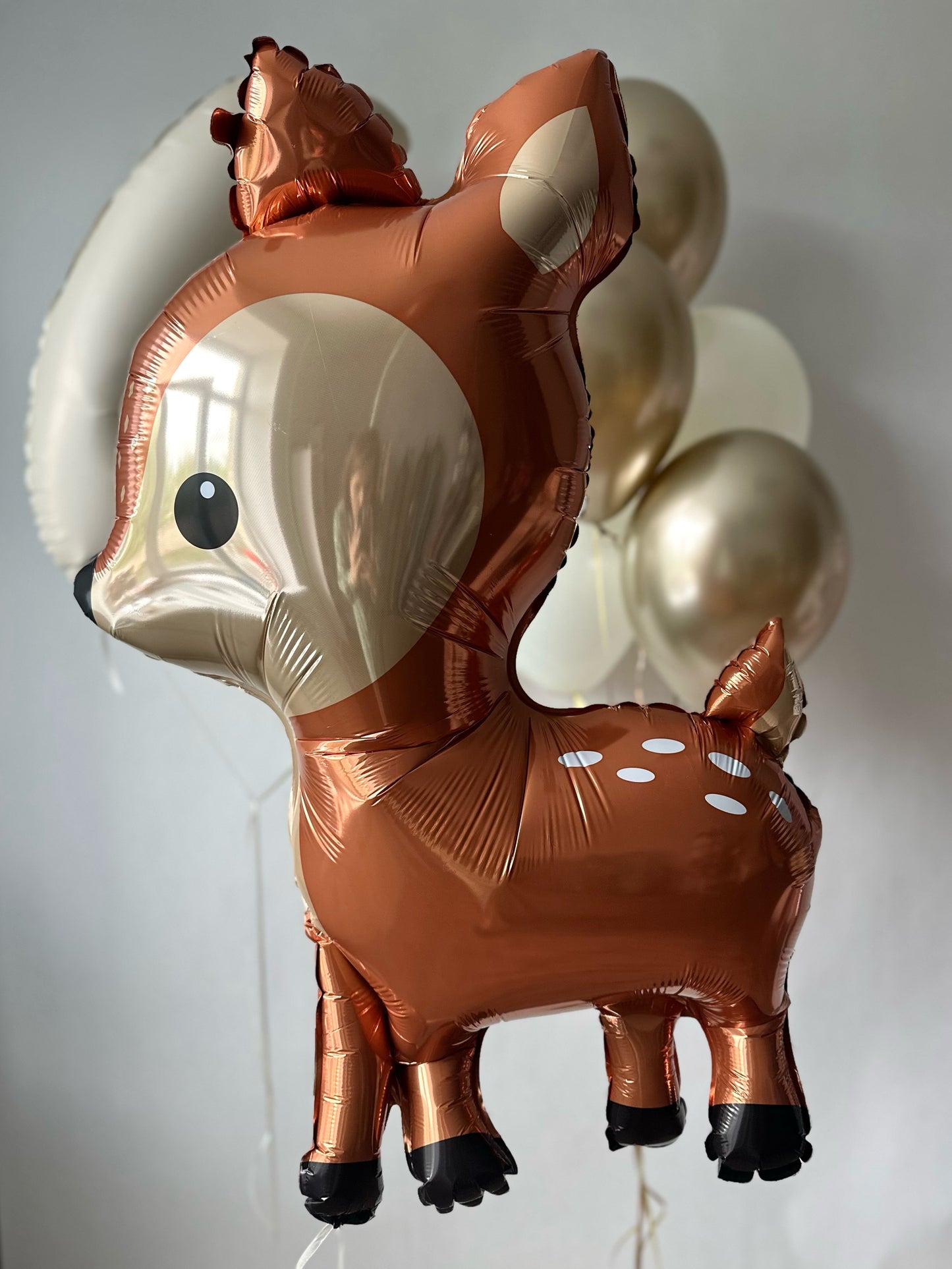 Forest Friends balloon set with deer balloon, number balloon, and woodland birthday decor in New York