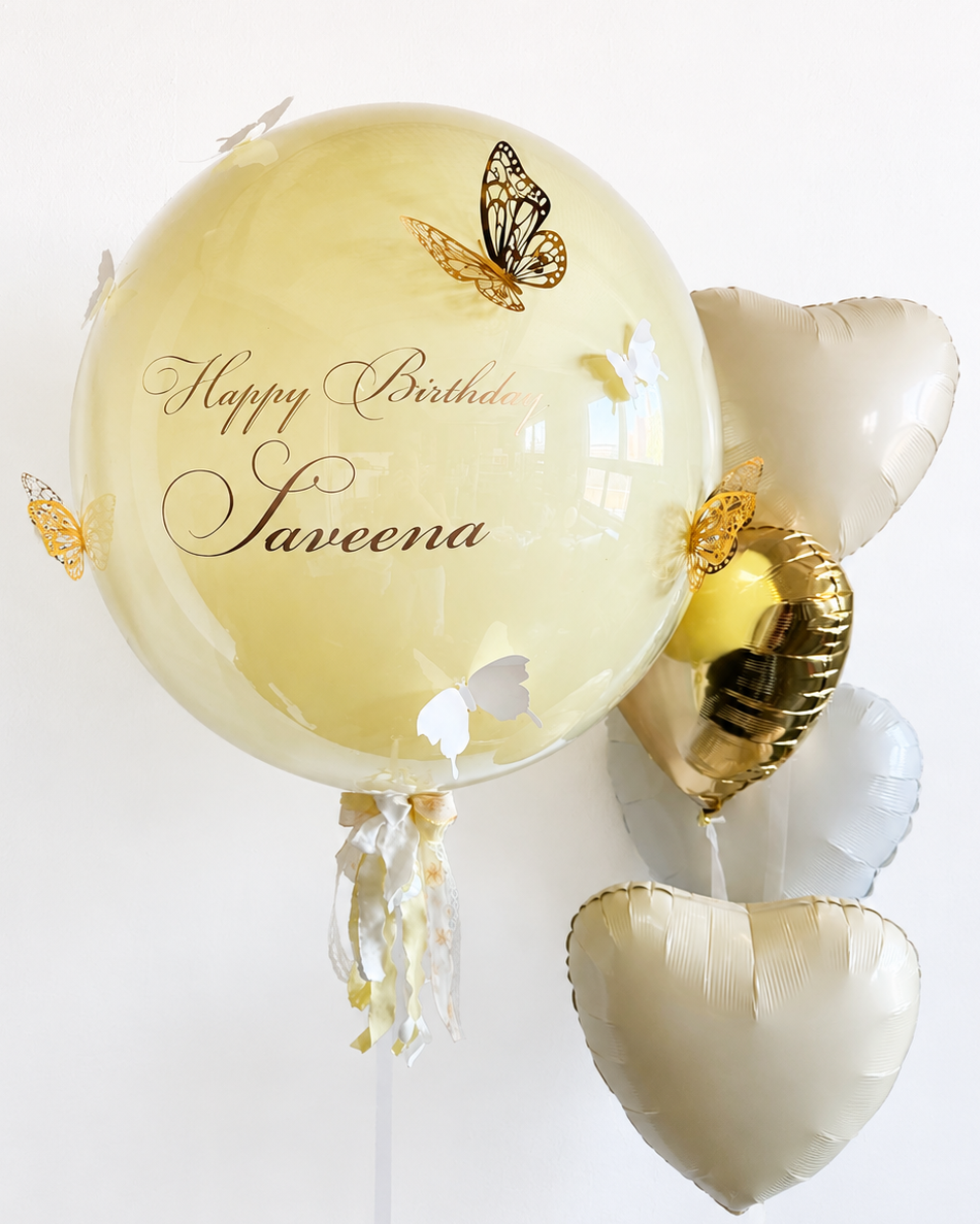 Golden Butterfly Bubble Balloon Set with personalized bubble balloon, butterfly details, and white champagne gold heart balloons for celebrations in New York
