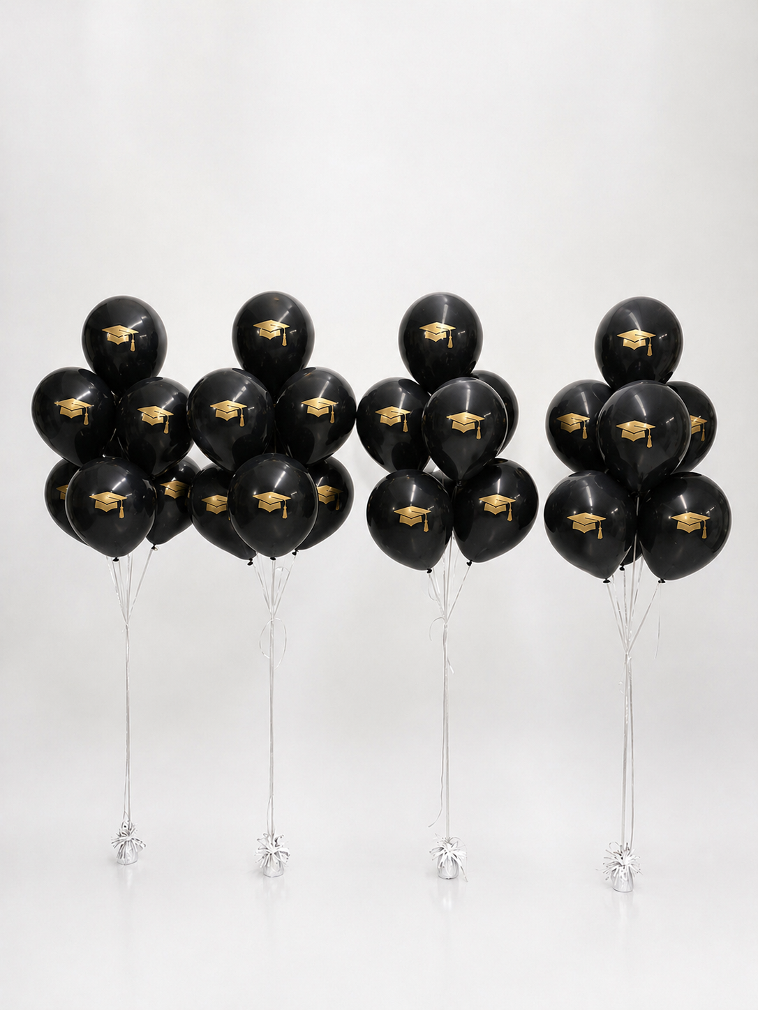 Graduation Cap Balloon Bouquets with black printed balloons for graduation event decor in Jersey City