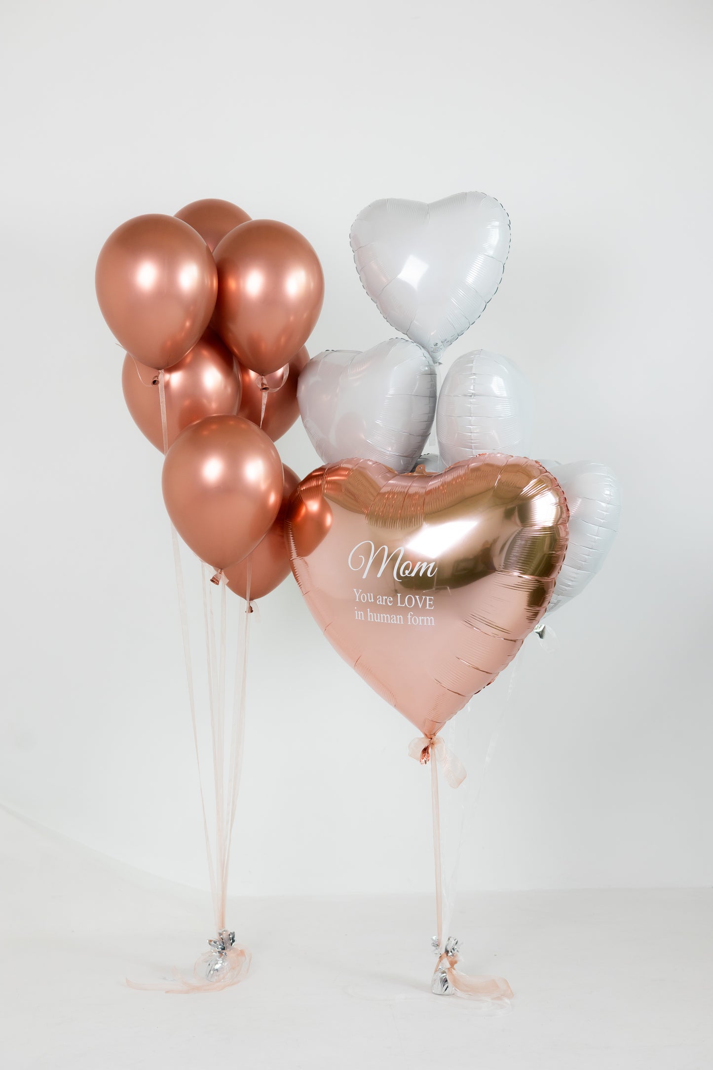 Love You balloon set with custom large heart balloon and foil heart balloons for romantic decor in New York