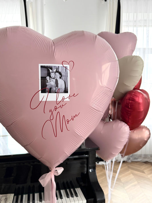 Love You Mom balloon set with giant personalized heart balloon, photo detail, and pink heart balloons for celebration decor in Queens