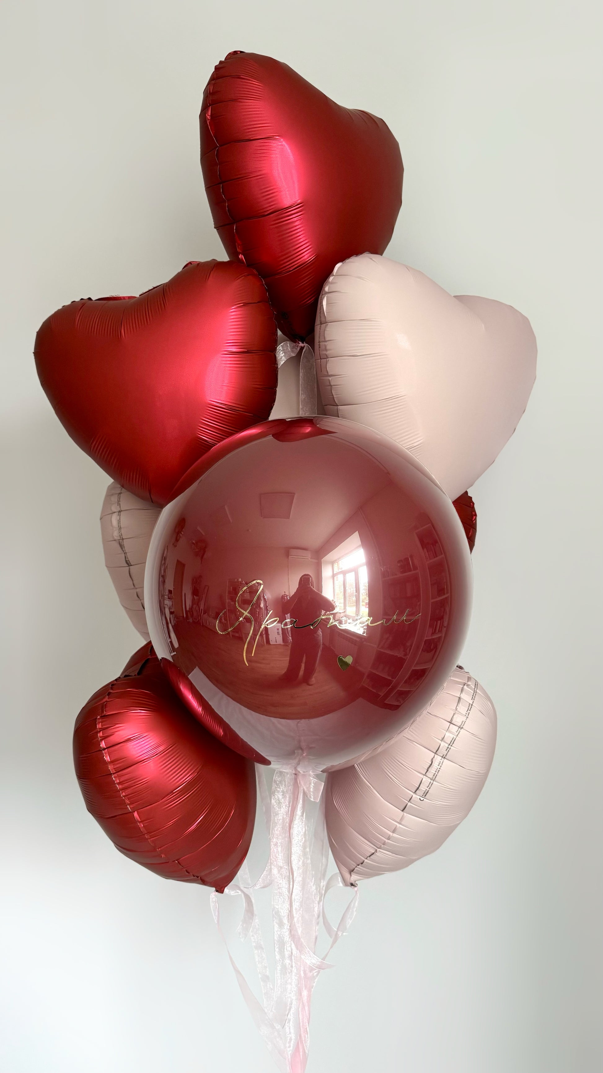 Romantic bubble balloon set with heart balloons and custom sign for celebration decor in New York
