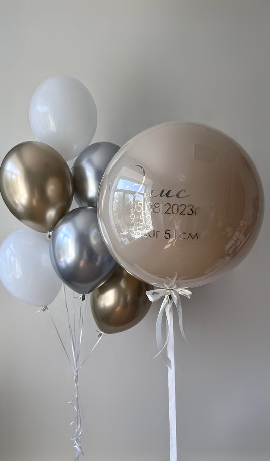 Neutral baby welcome balloon decor with custom birth details bubble balloon in Brooklyn