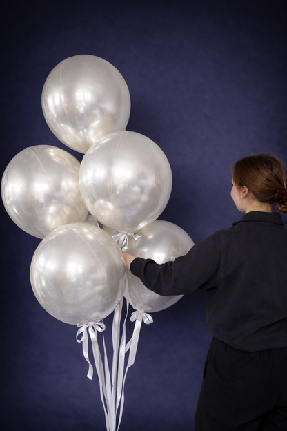 Pearl white bubble balloon bouquet styled for luxury celebration decor in Brooklyn