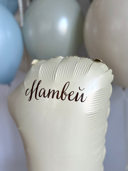 Close-up of personalized birthday number balloon with custom name for celebration decor in Brooklyn