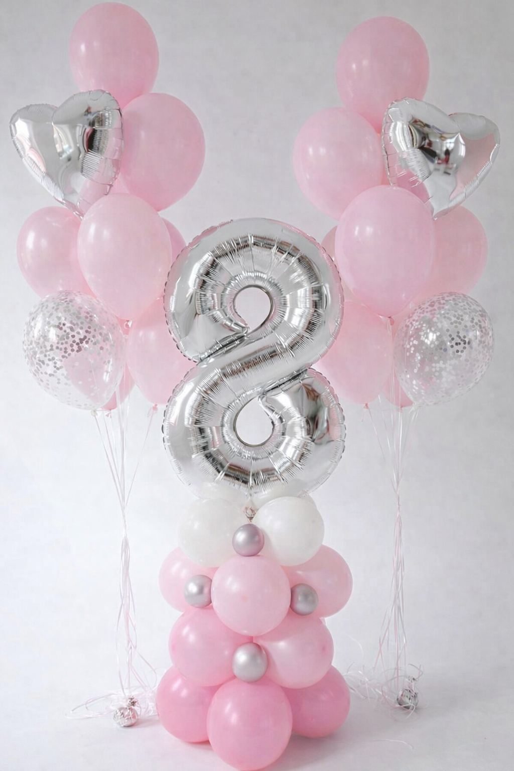 Pink Number balloon set with silver number balloon, heart balloons, and confetti balloons for birthday decor in Brooklyn