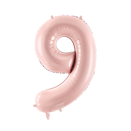 Pink number 9 balloon on a white background