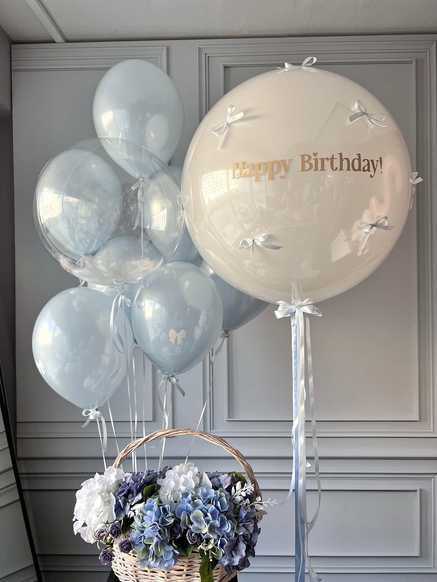 Popsicle birthday balloon set with custom sign bubble balloon, bows, and soft blue birthday decor in New York