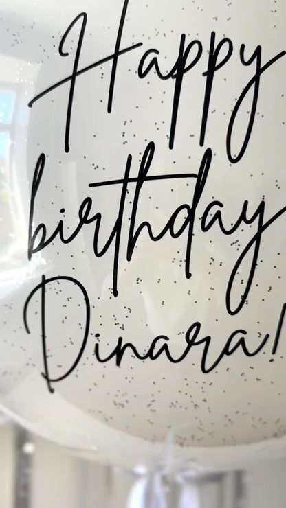 Luxury white and silver balloon decor with custom printed bubble balloon in Manhattan