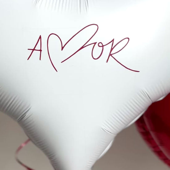 Video of heart balloon bouquet with personalized white heart balloon for romantic surprise decor in Brooklyn