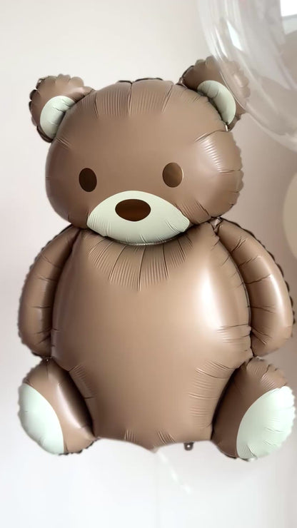 Video of teddy bear balloon with caramel-toned balloons for baby celebration decor in NYC
