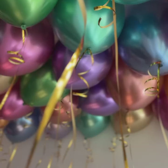 Metallic reflex helium ceiling balloons with ribbons in NYC
