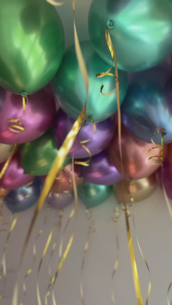 Metallic reflex helium ceiling balloons with ribbons in NYC
