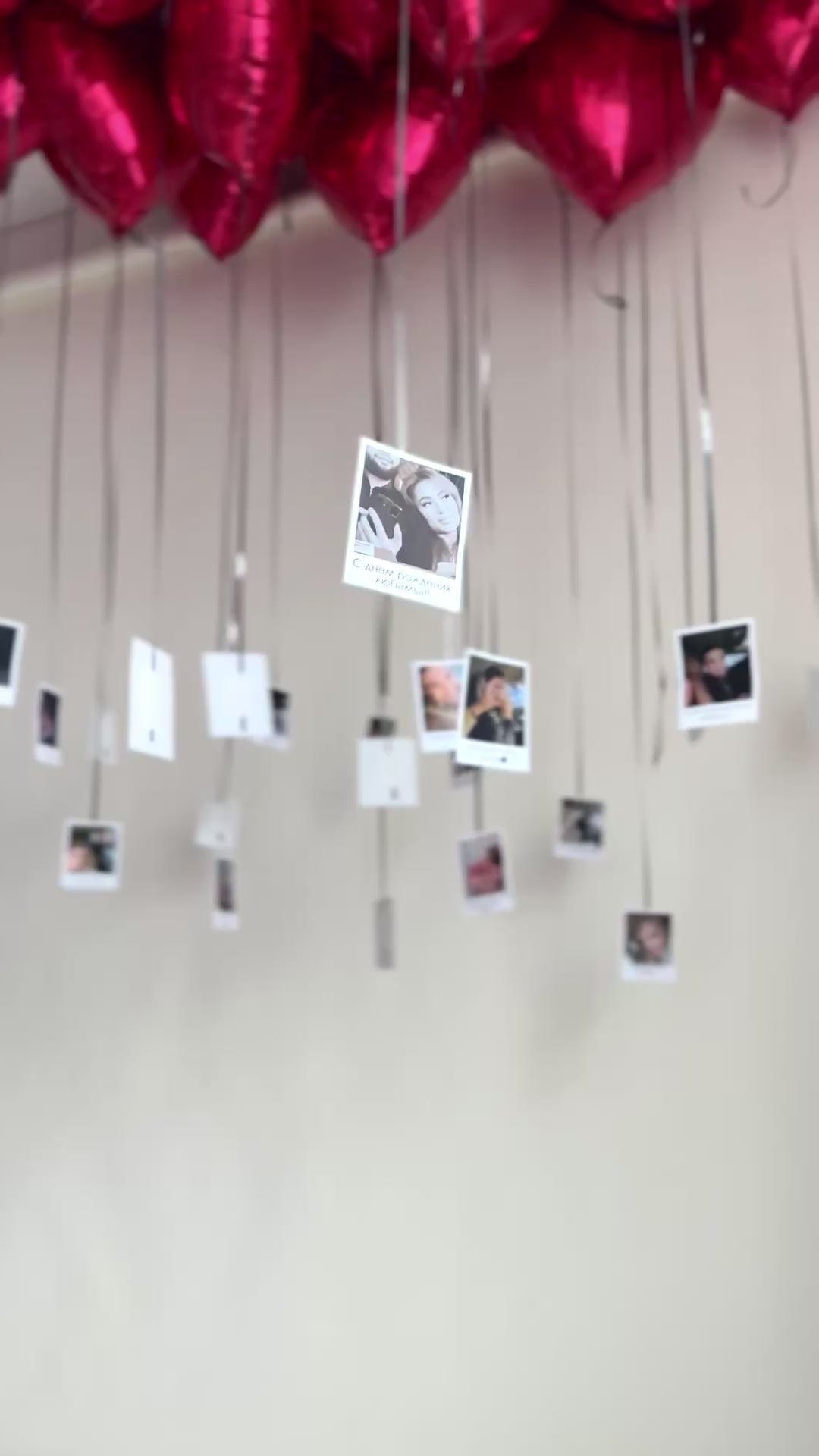 Video of personalized heart balloons with hanging photos for surprise decor in Brooklyn