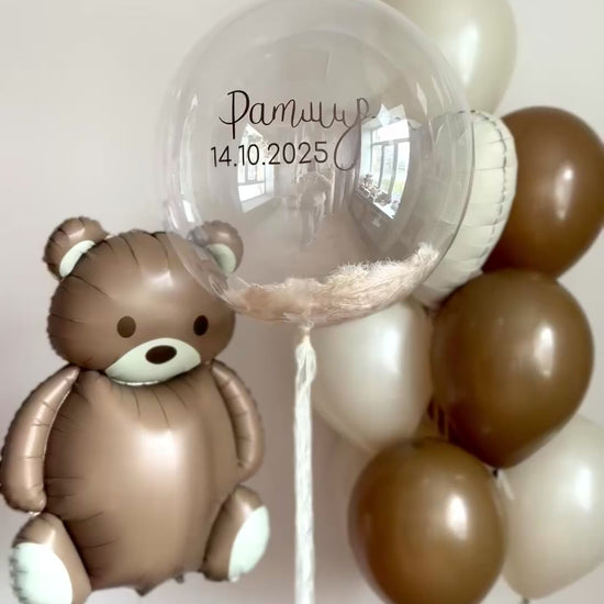 Video of caramel balloon arrangement with teddy bear balloon and personalized bubble balloon in NYC
