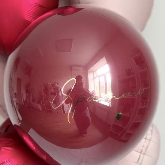 Video of romantic bubble balloon arrangement with red and blush heart balloons in Brooklyn