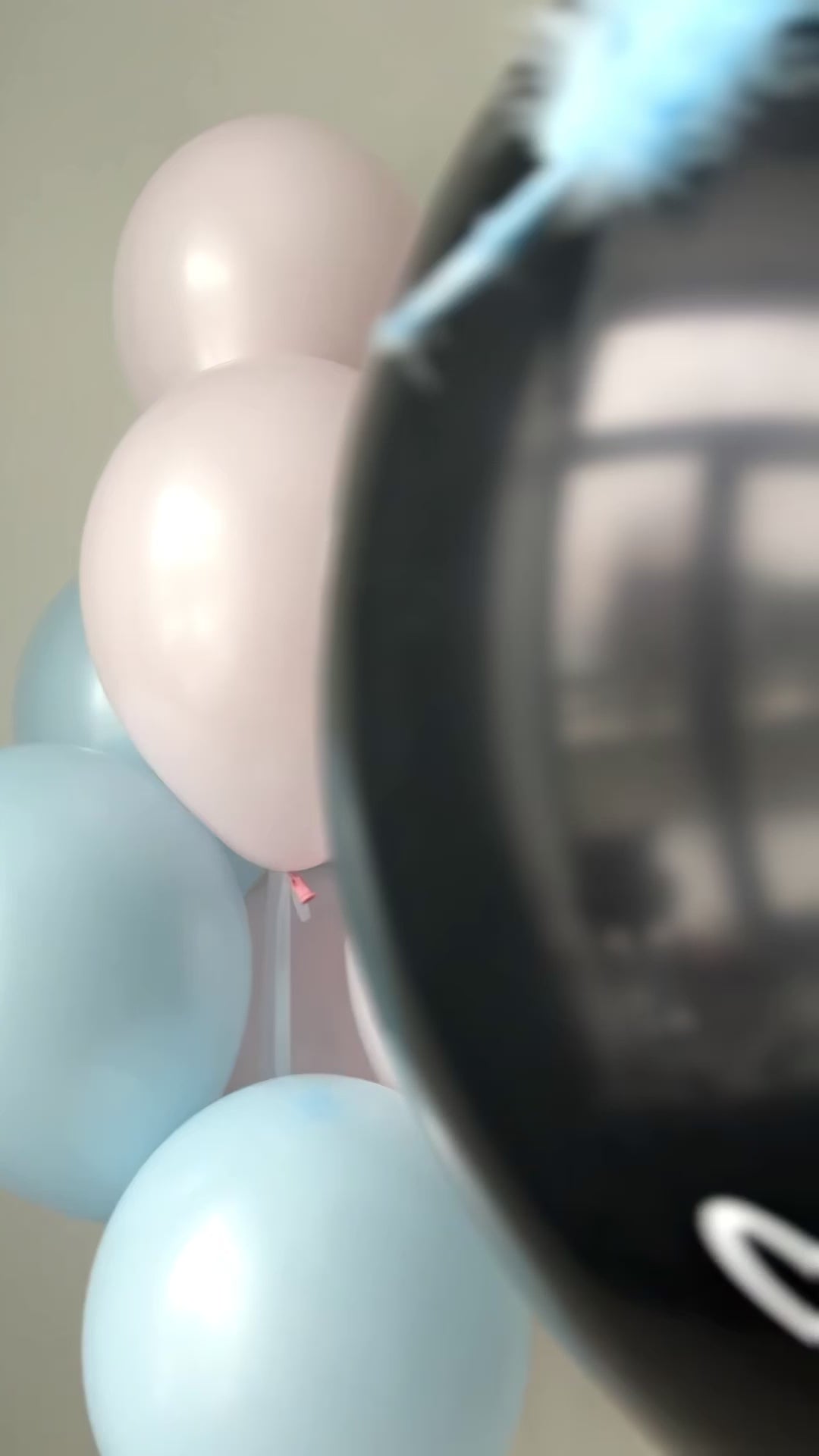 Close-up of Boy or Girl balloon for elegant gender reveal party decor in Manhattan