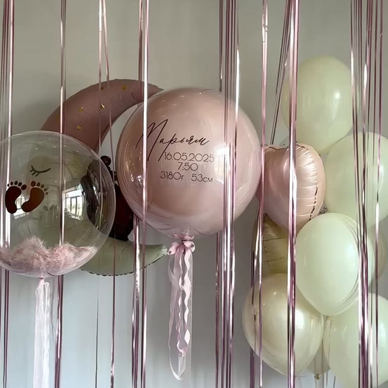 Video of baby blossom balloon decor with pastel ceiling balloons and custom bubble balloon in Brooklyn
