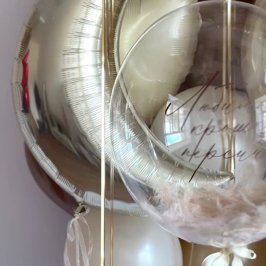 Close-up of moon balloon and custom bubble balloon in luxury baby decor styling in Brooklyn