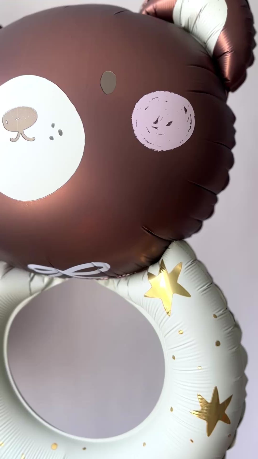 Video of teddy bear foil balloon and baby celebration setup in Queens