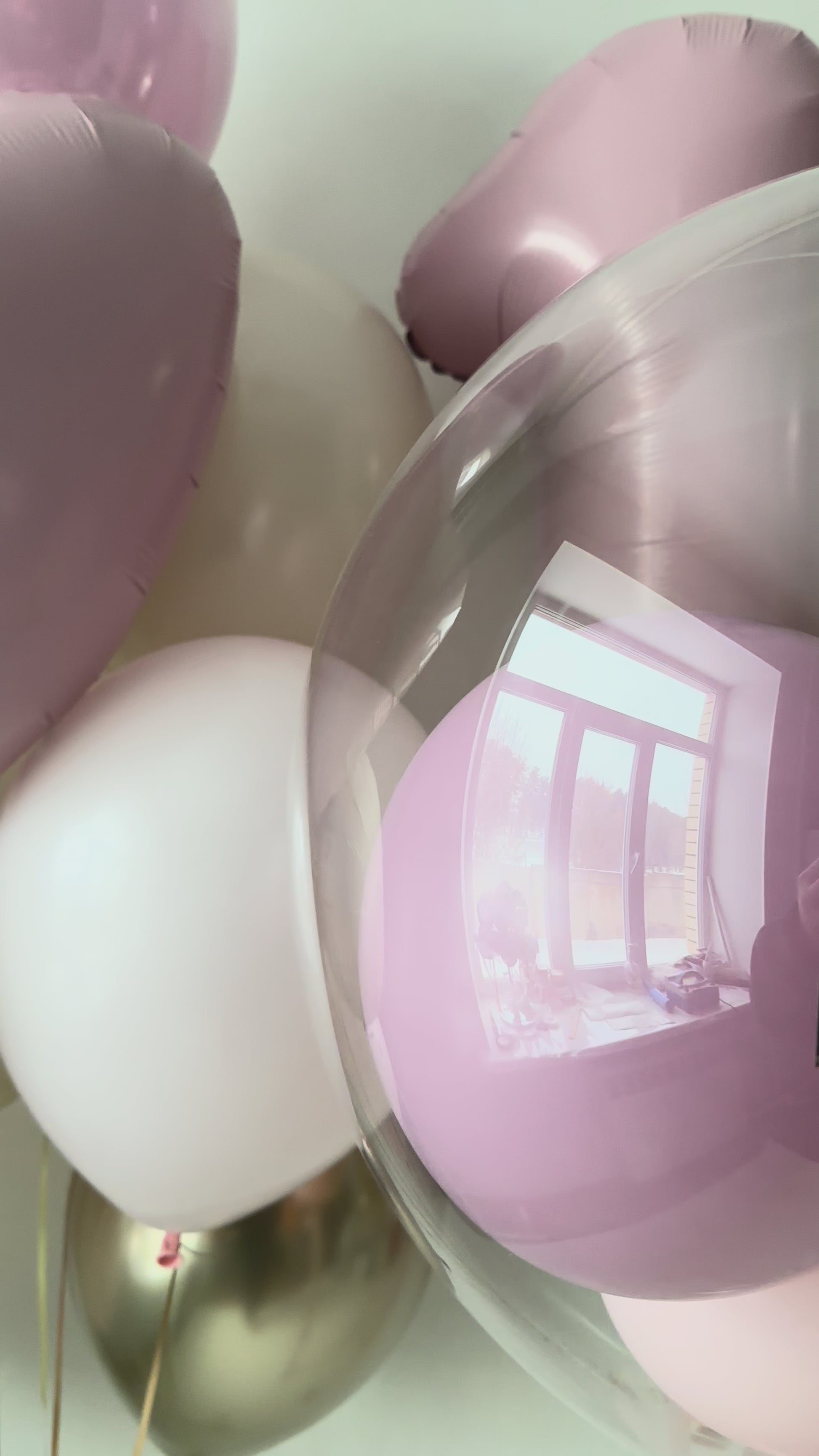 Pink and neutral heart balloon decor with custom number balloon setup in Manhattan