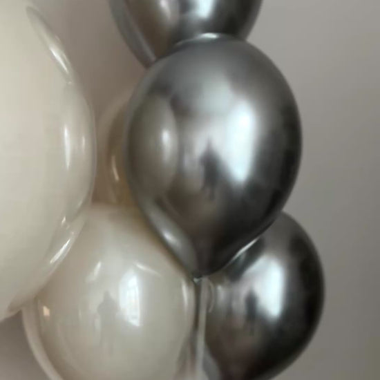 Video of pearl and silver bubble balloon set with personalized sign and coordinating balloons in NYC

